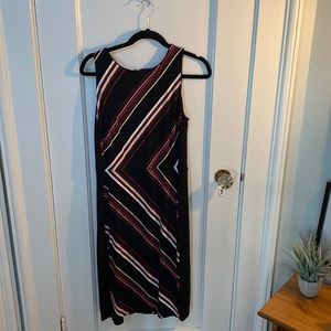 Asymmetrical “pencil” dress… perfect for buttoned-up events!